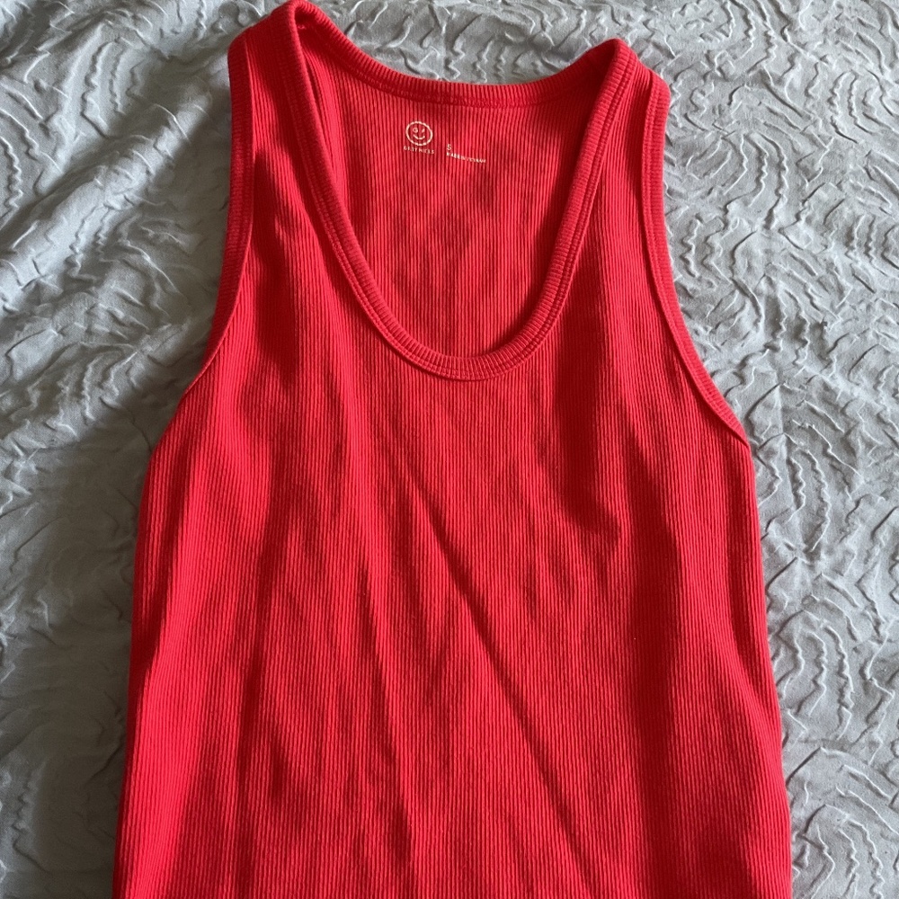 Reddish orange tank top